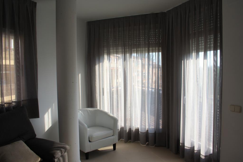 Ar Apartamentos Soto Real Pokoj fotografie